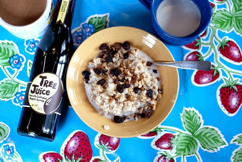 still life photo of aple syrup and oatmeal