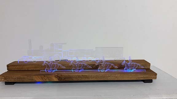 wood and plexiglass lighted train sculpture