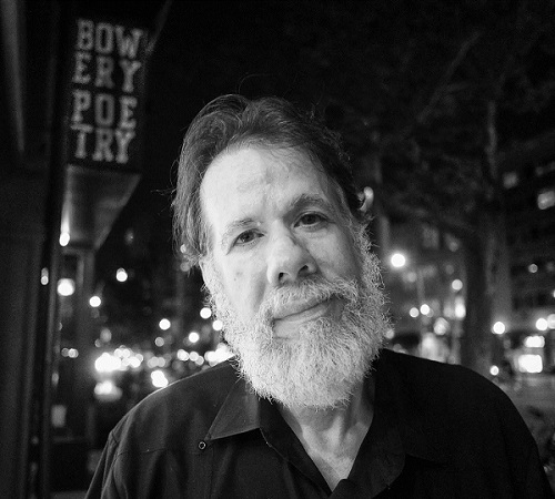 Martin Espada Poet in front of Bowery Poetry